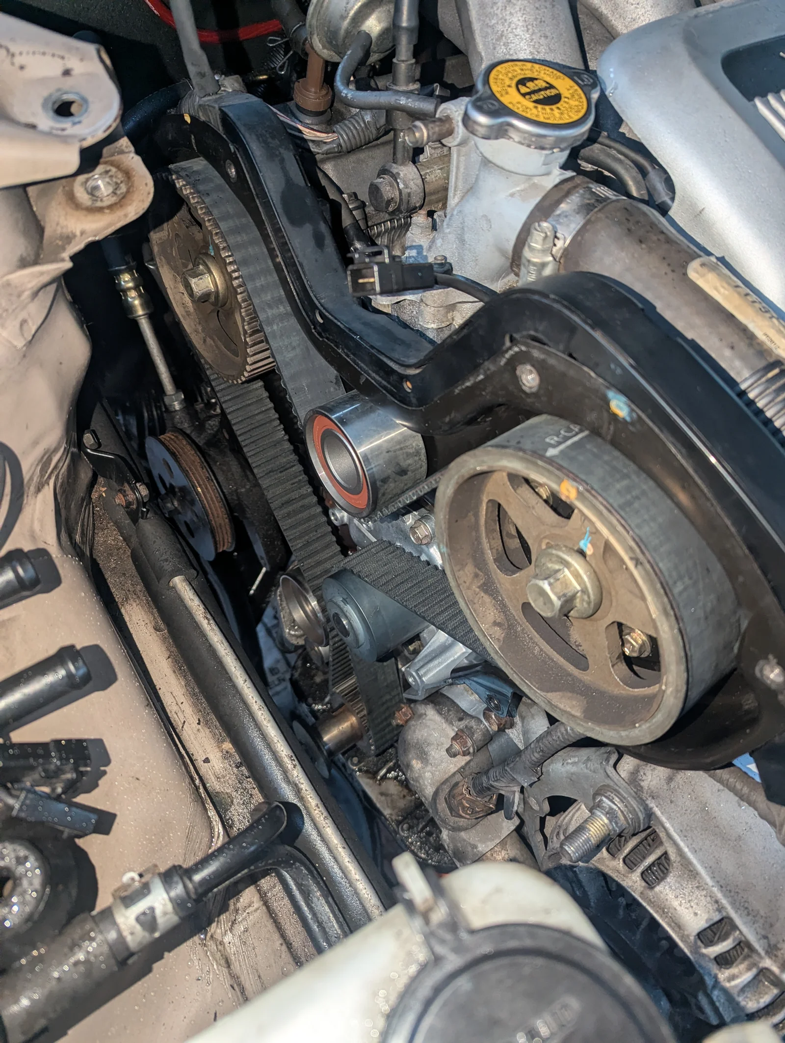 Exposed timing belt and pulleys during the Camry engine restoration